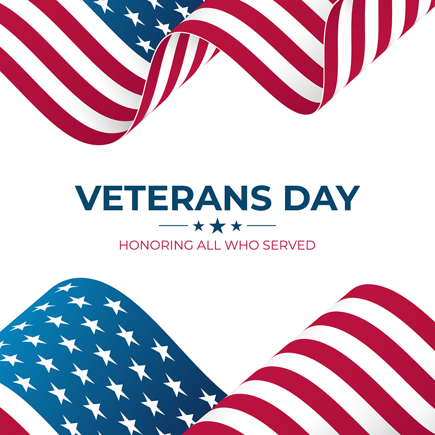 An illustration with waving American flags at top and bottom. In the center, on a white background, are the words "Veterans Day" and "Honoring All Who Served."