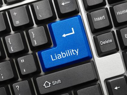 Image of a computer keyboard with a key marked "LIABILITY."