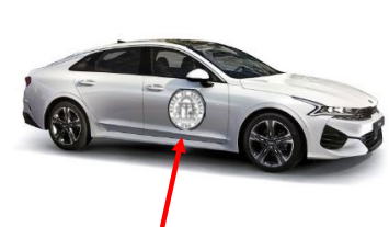 Red arrow pointing to decal on silver colored sedan