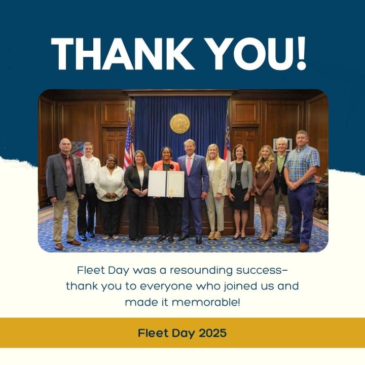 Picture depicts a graphic with blue and white background colors. The text at the top reads "Thank You", a image is centered in the middle of the graphic of the DOAS Fleet Team, DOAS Commissioner and Deputy Commissioner. Governor Brian Kemp stands in the middle of the image holding the Fleet Day Proclamation with DOAS Fleet Management Director Jazzmin Randal. 